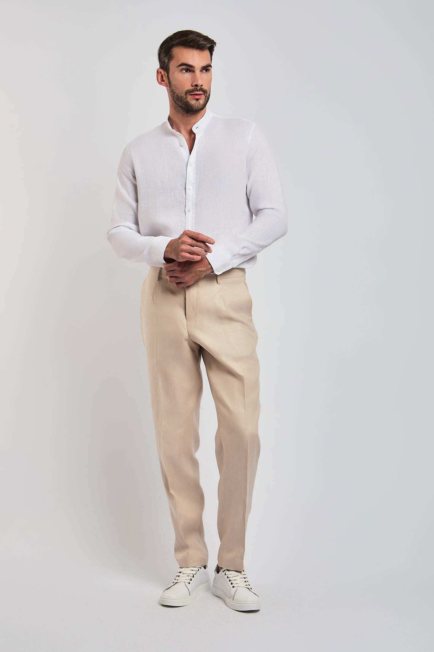 Dalydress men's casual outfit with white shirt, beige trousers, and white sneakers