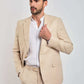 Man wearing beige suit and white shirt, Dalydress menswear, modern Egyptian fashion