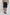 Dalydress men’s navy shorts with white nautical prints, striped shirt, and black sneakers