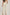 Dalydress women's high-waisted striped pants with belt, back view, beige top, neutral sandals
