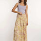 Woman in lilac tank top and yellow floral midi skirt by Dalydress, casual fashion