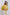 Woman wearing yellow tie-front top and white embellished pants, Dalydress fashion collection