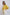 Woman in yellow tie-front blouse and white studded pants from Dalydress casual collection
