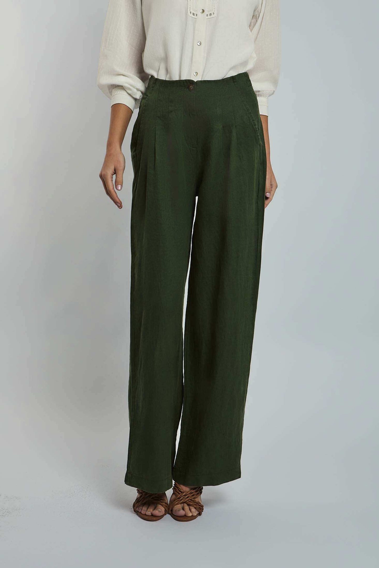 Dalydress women's wide-leg green pants paired with a white blouse, urban casual style