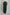 Dalydress women's green wide-leg pants with cream blouse, back view, studio setting