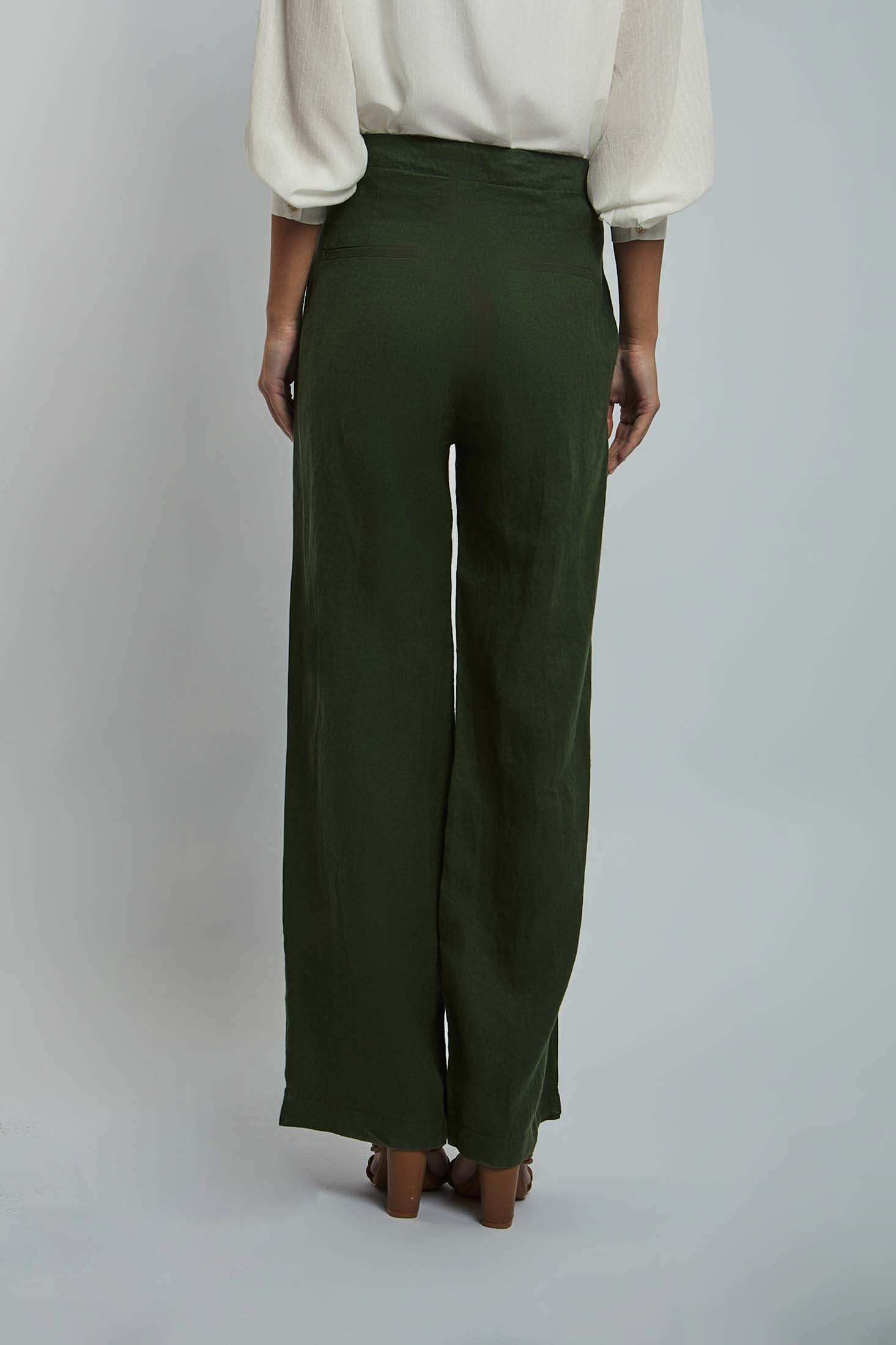 Dalydress women's green wide-leg pants with cream blouse, back view, studio setting