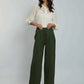 Dalydress women's fashion: model in white embroidered blouse and green wide-leg pants