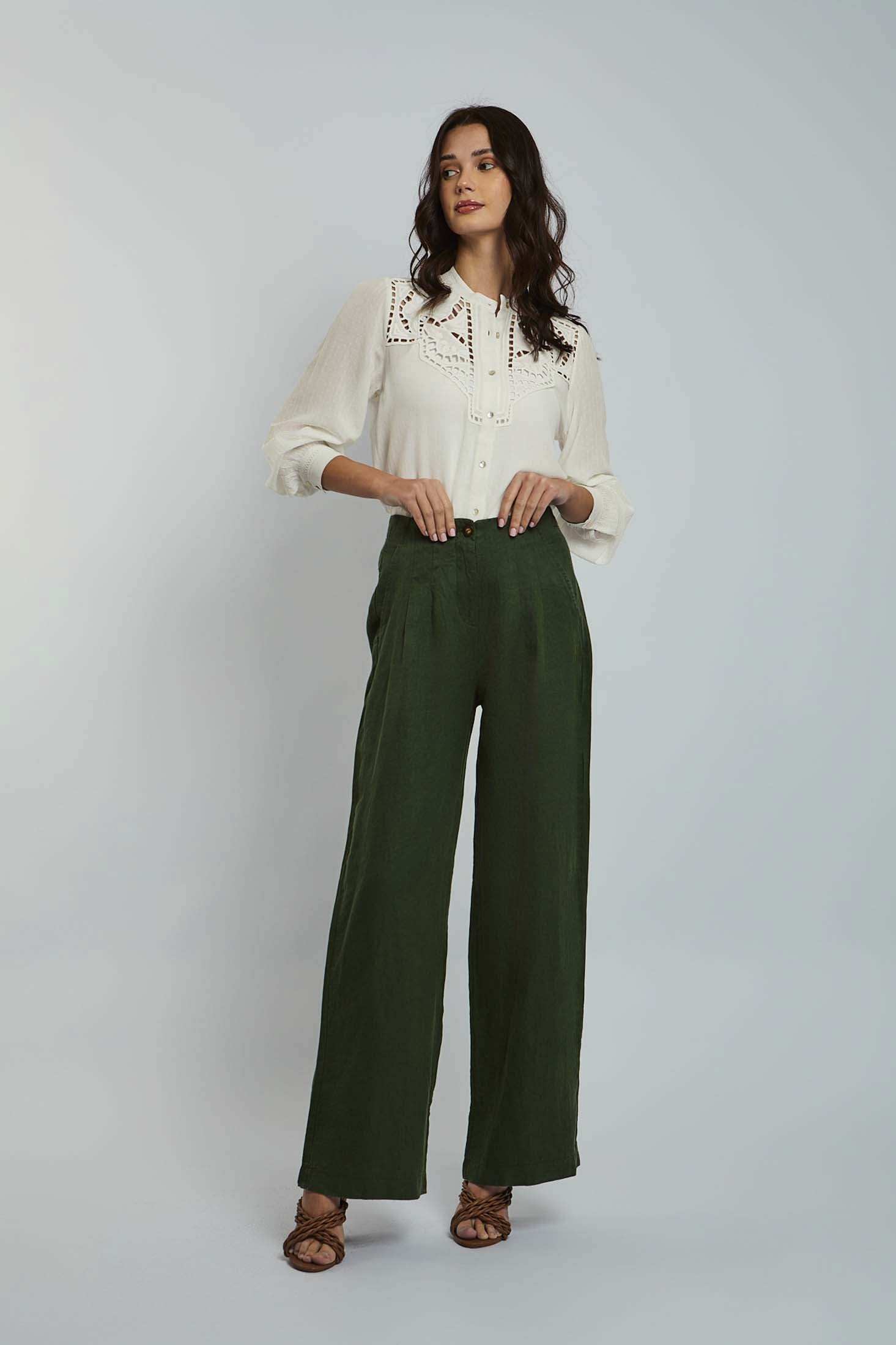 Dalydress women's fashion: model in white embroidered blouse and green wide-leg pants