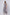 Woman in Dalydress sleeveless navy floral maxi dress, standing against light background