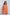 Woman wearing an orange belted long-sleeve Dalydress shirt with chest pockets.
