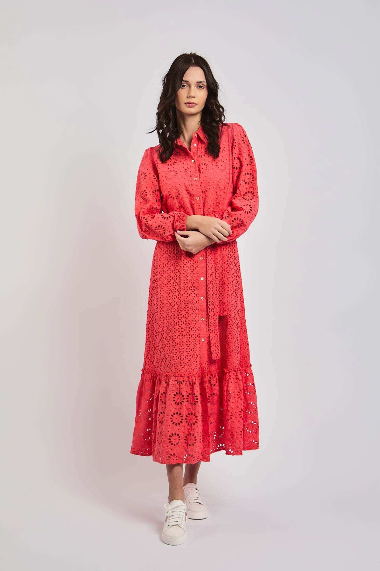 Woman modeling pink embroidered long-sleeve dress from Dalydress, white background