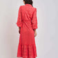 Woman wearing a coral eyelet midi dress with long sleeves, back view, Dalydress fashion