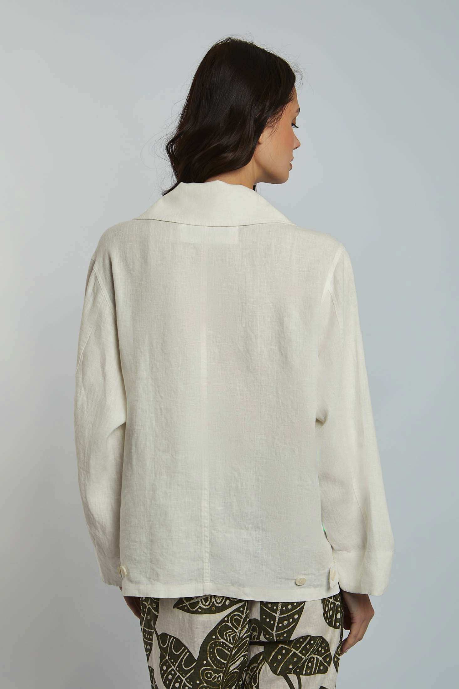 Dalydress women's off-white long sleeve shirt with collar, shown from the back, paired with patterned pants