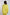 Woman wearing yellow embroidered long-sleeve shirt and matching pants, back view