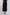 Black women's midi skirt with beige embroidery at hem, styled with nude heeled sandals