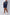 Dalydress men's navy blue shorts with white waistband and side pocket accents, styled with sneakers