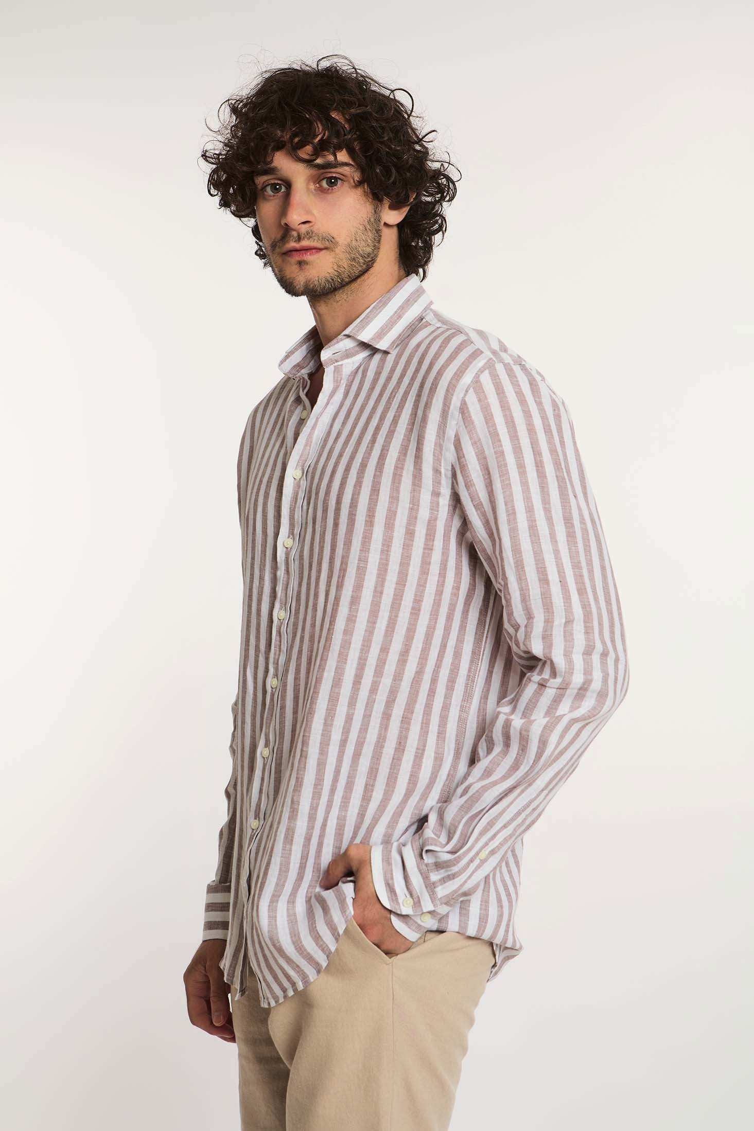 Dalydress men's beige and white striped casual shirt, long sleeves, model standing sideways