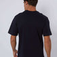 Dalydress men's plain black t-shirt back view with nautical print shorts