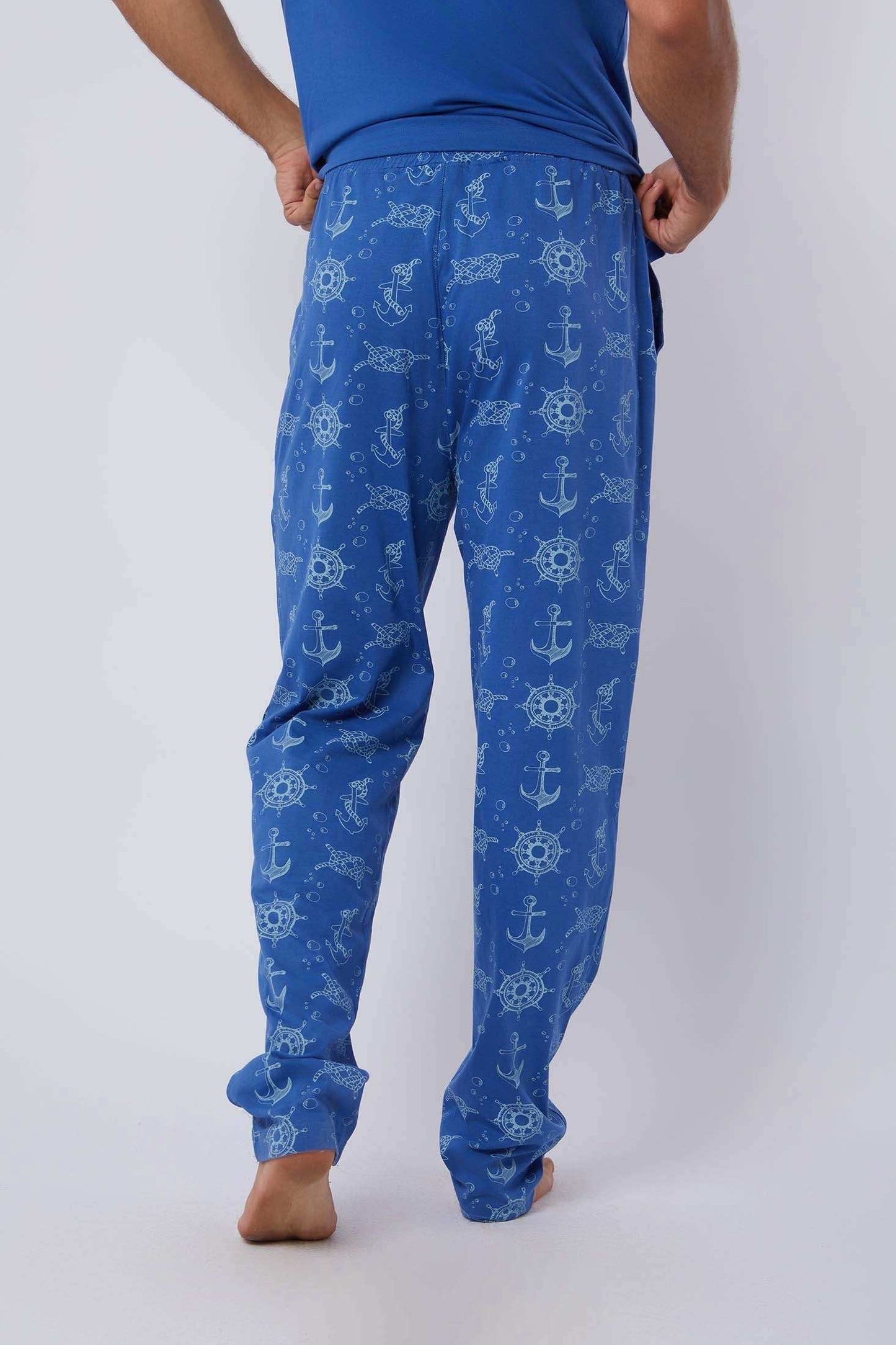 Dalydress men's blue pajama pants with nautical print, anchors and ship wheels, back view