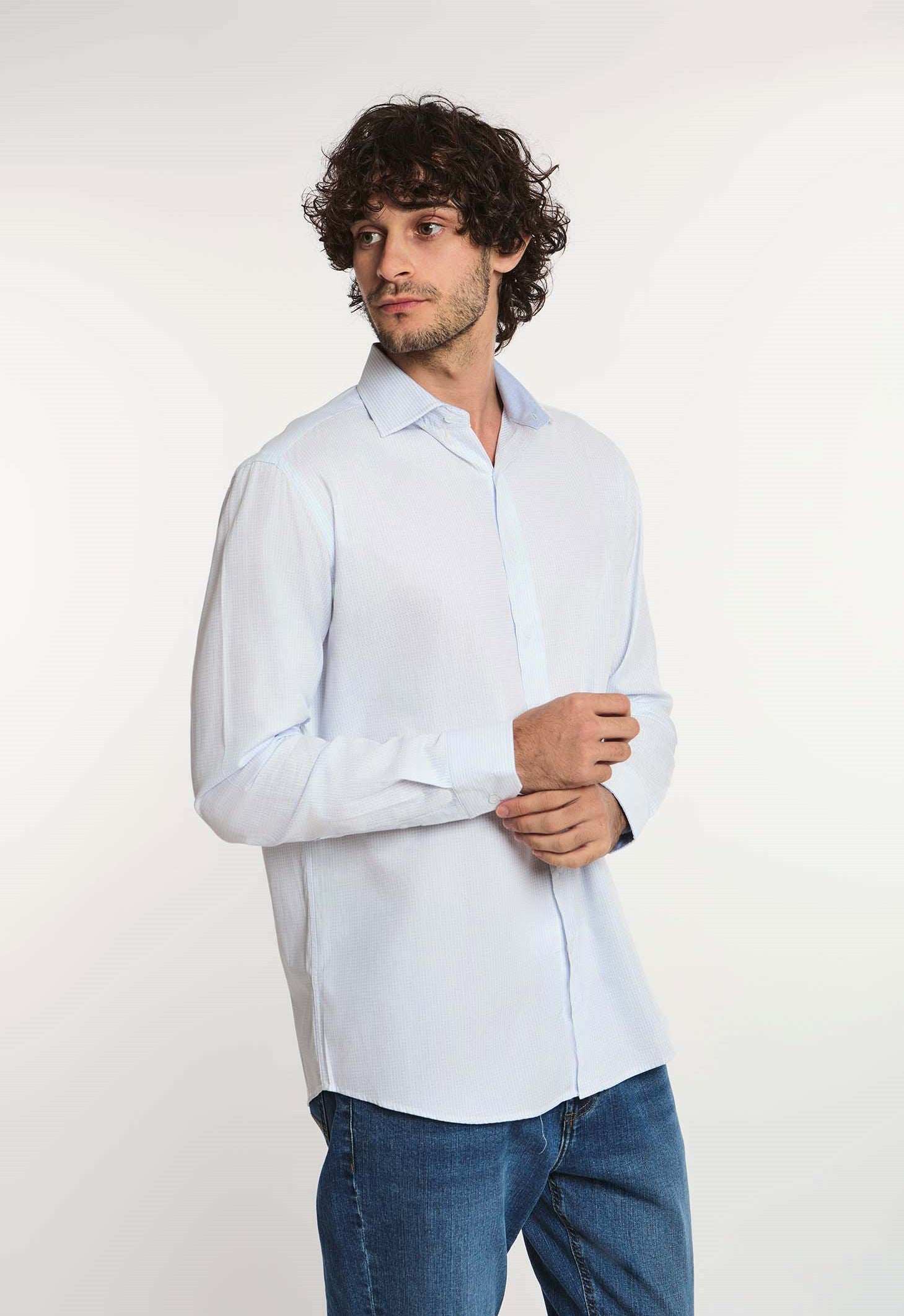 Dalydress men's light blue long sleeve shirt paired with blue jeans on model