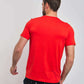 Dalydress men's red short sleeve t-shirt, back view, with navy patterned trousers