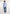 Man wearing light blue dress shirt, blue jeans, and white sneakers, Dalydress men's fashion