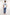 Dalydress men's casual wear with white printed t-shirt and blue pants, studio setting