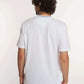 Dalydress men's fashion, man in white t-shirt and blue pants, back view, studio setting