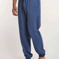 Dalydress men's blue drawstring jogger pants, casual loungewear, studio background