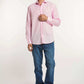 Dalydress men's casual look with light pink shirt, blue jeans, and white sneakers