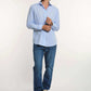 Dalydress men's casual blue button-down shirt with jeans and sneakers, studio background