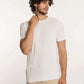 Man wearing Dalydress white short sleeve shirt and beige pants, casual men's fashion