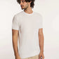 Dalydress men's casual white short-sleeve knit shirt with beige pants, studio background