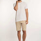 Dalydress casual men’s fashion: white t-shirt, beige shorts, brown slip-on shoes