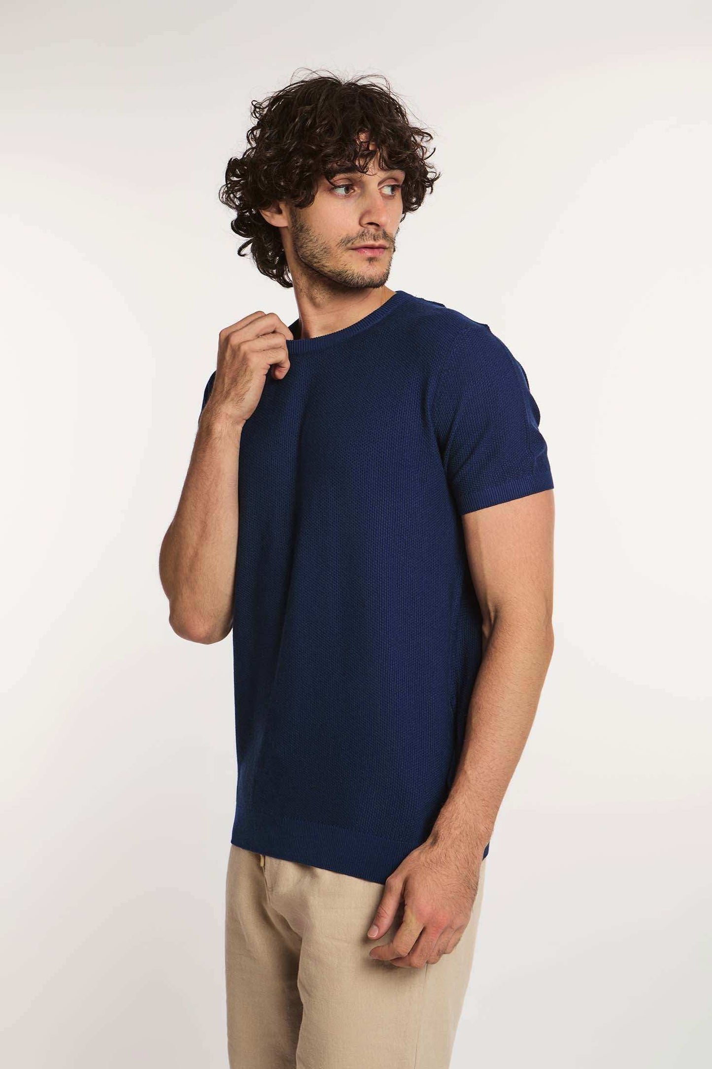Dalydress men's casual blue short-sleeve shirt with beige pants, studio background