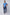 Dalydress men's casual fashion, model in blue polo shirt and jeans, white sneakers