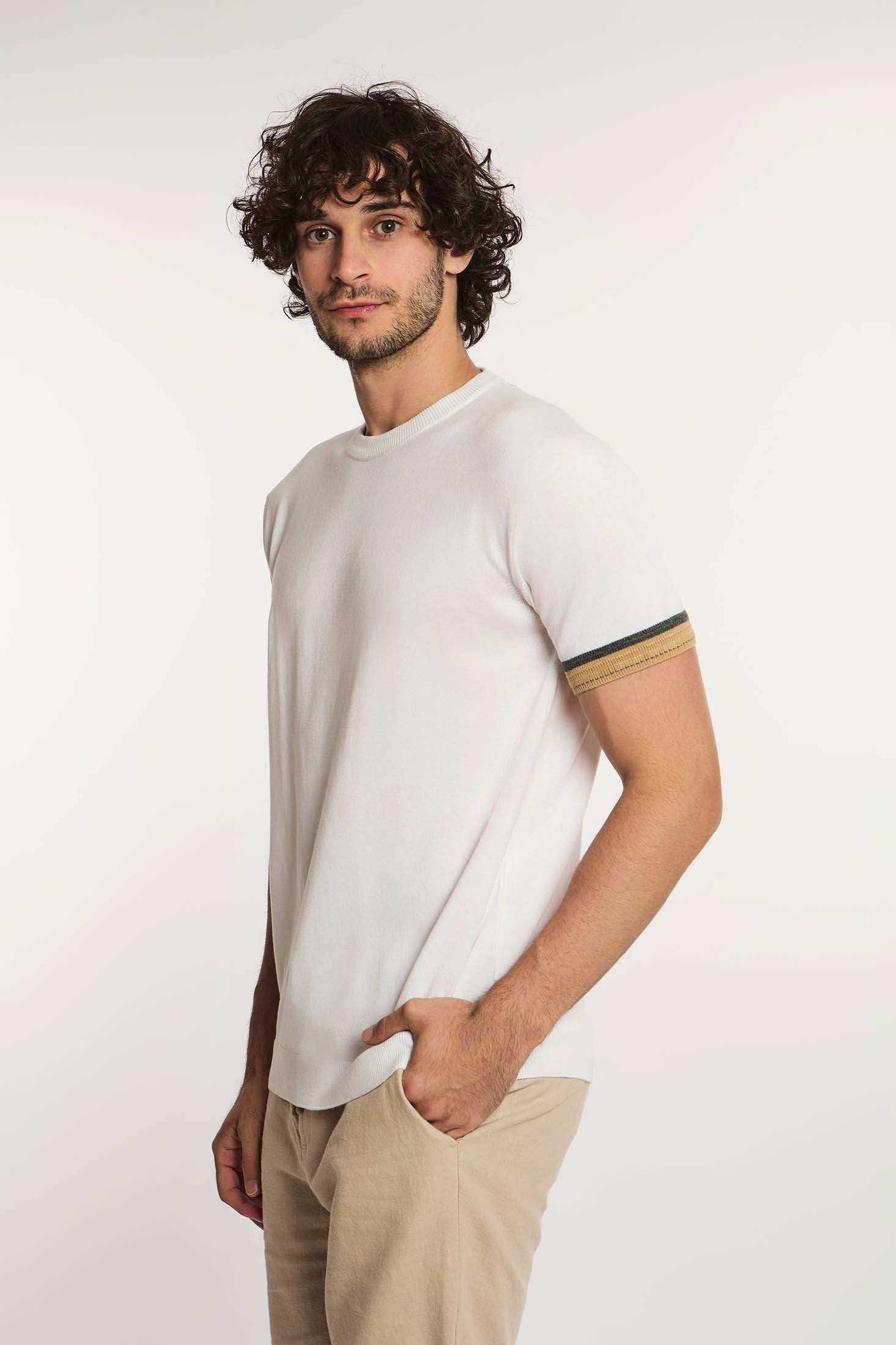 Man modeling Dalydress casual white short-sleeve shirt with striped sleeve detail