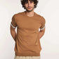 Dalydress men's casual brown short-sleeve shirt with white trim, beige pants, studio shot