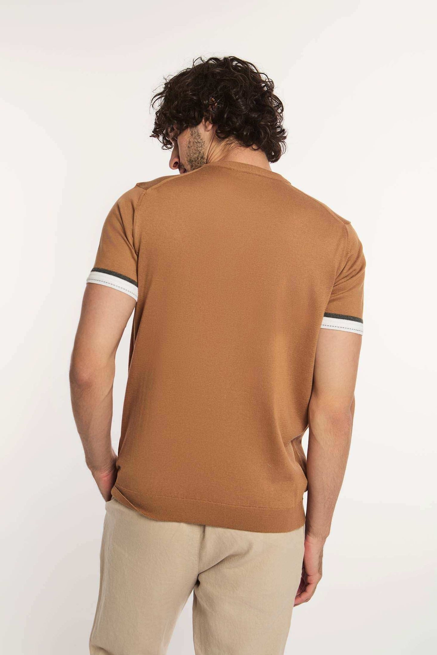 Dalydress men's casual brown short sleeve shirt with white trim, back view, beige pants