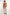 Dalydress men's casual outfit with camel knit short-sleeve shirt and beige trousers