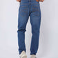 Dalydress men's blue jeans with back pockets, striped shirt, and white sneakers