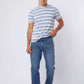 Dalydress men’s blue striped t-shirt with blue jeans and white sneakers, casual outfit