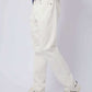 Dalydress men's white jeans styled with white sneakers and a navy blue shirt