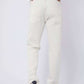 Dalydress men's white jeans, back view, paired with a navy shirt and white sneakers