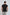 Dalydress men's black short sleeve t-shirt, back view, paired with light grey pants