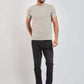 Dalydress men's casual outfit with light grey t-shirt, dark jeans, and white sneakers