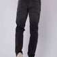 Dalydress men's black denim jeans back view with casual orange shirt and white sneakers