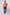 Man wearing coral polo shirt, black jeans, and white sneakers, Dalydress men's casual fashion