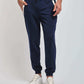 Dalydress men’s navy jogger pants with white drawstring and pockets, paired with white sneakers