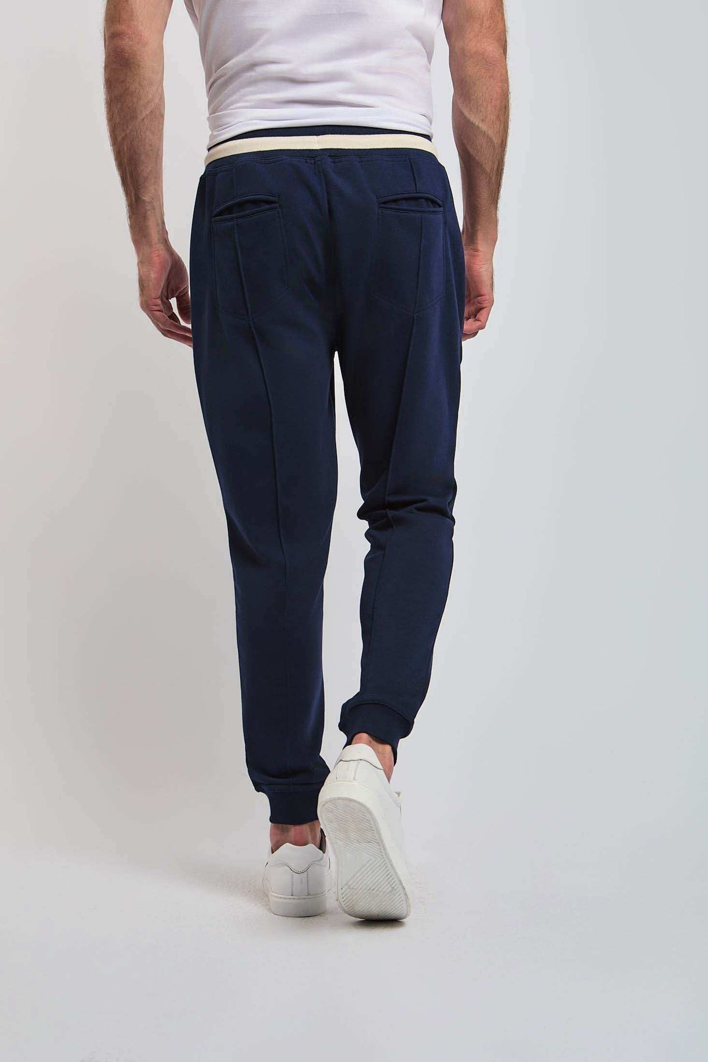 Dalydress men's navy jogger pants with back pockets, white sneakers, and white waistband